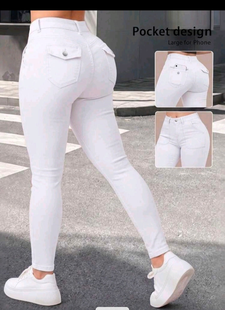White high-waisted skinny jeans showing pocket details